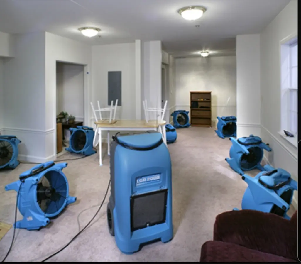 Air movers and dehumidifier setup for Water Damage Restoration in Portage Lakes